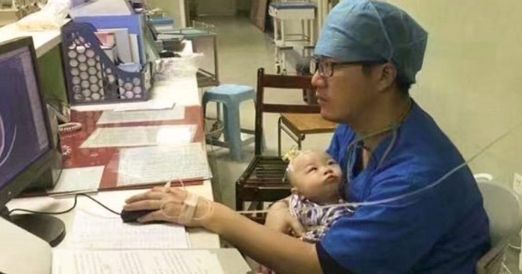 Pediatric-Doctor-Turns-'Human-Pacifier'-to-Crying-Baby,-Inspires-Netizens